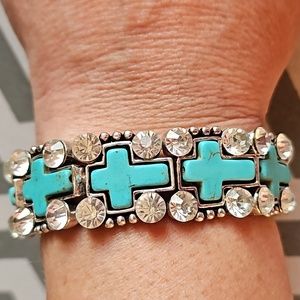Turquoise cross and sparkley stones stretch bracelet